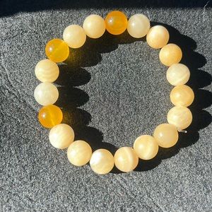 Made with crystals .. citrine and calcite made with 10mm beads